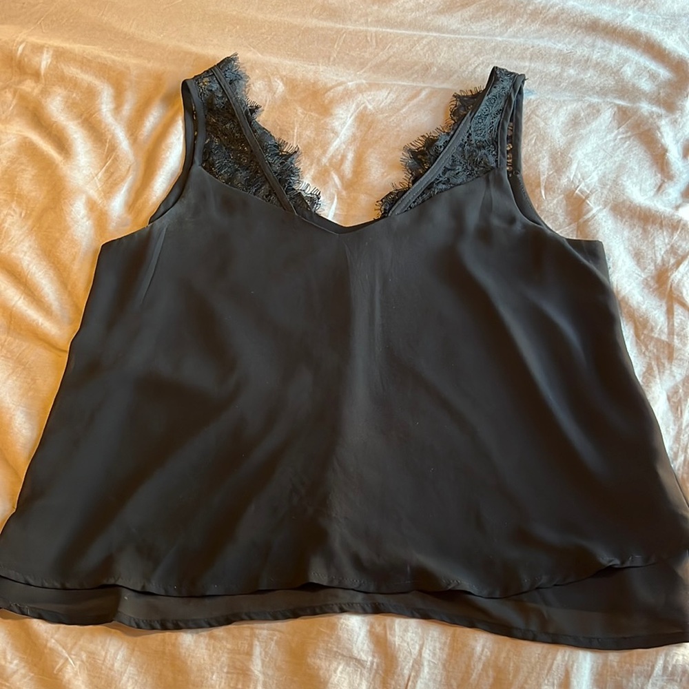 Black flowy tank with lace shoulder detailing medium
